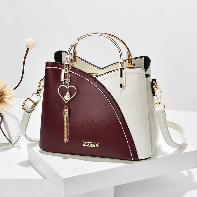 MODÉ BELLE HANDBAG